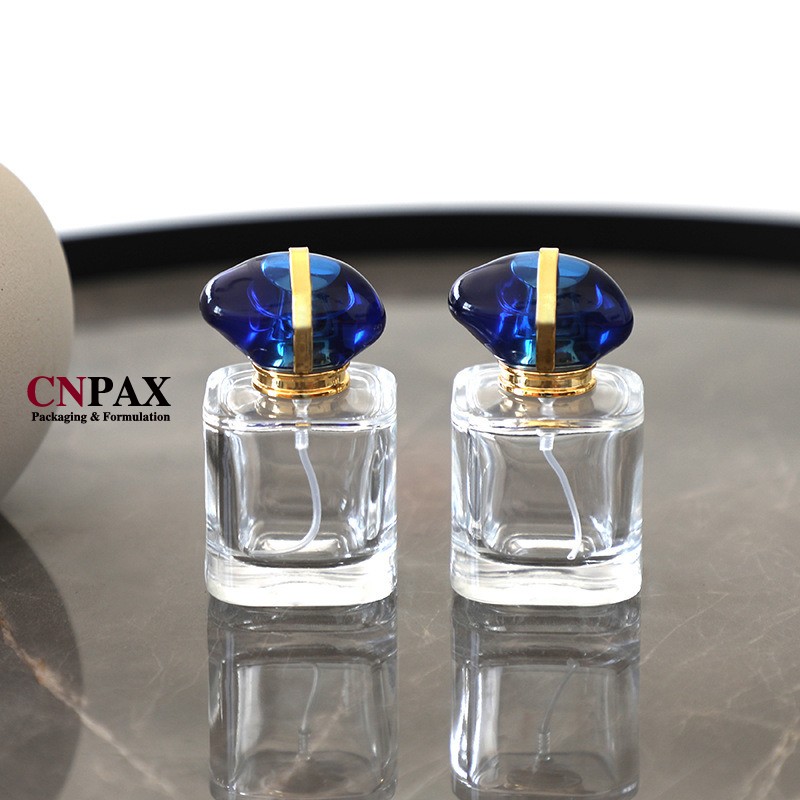 perfume bottle with sapphire cap